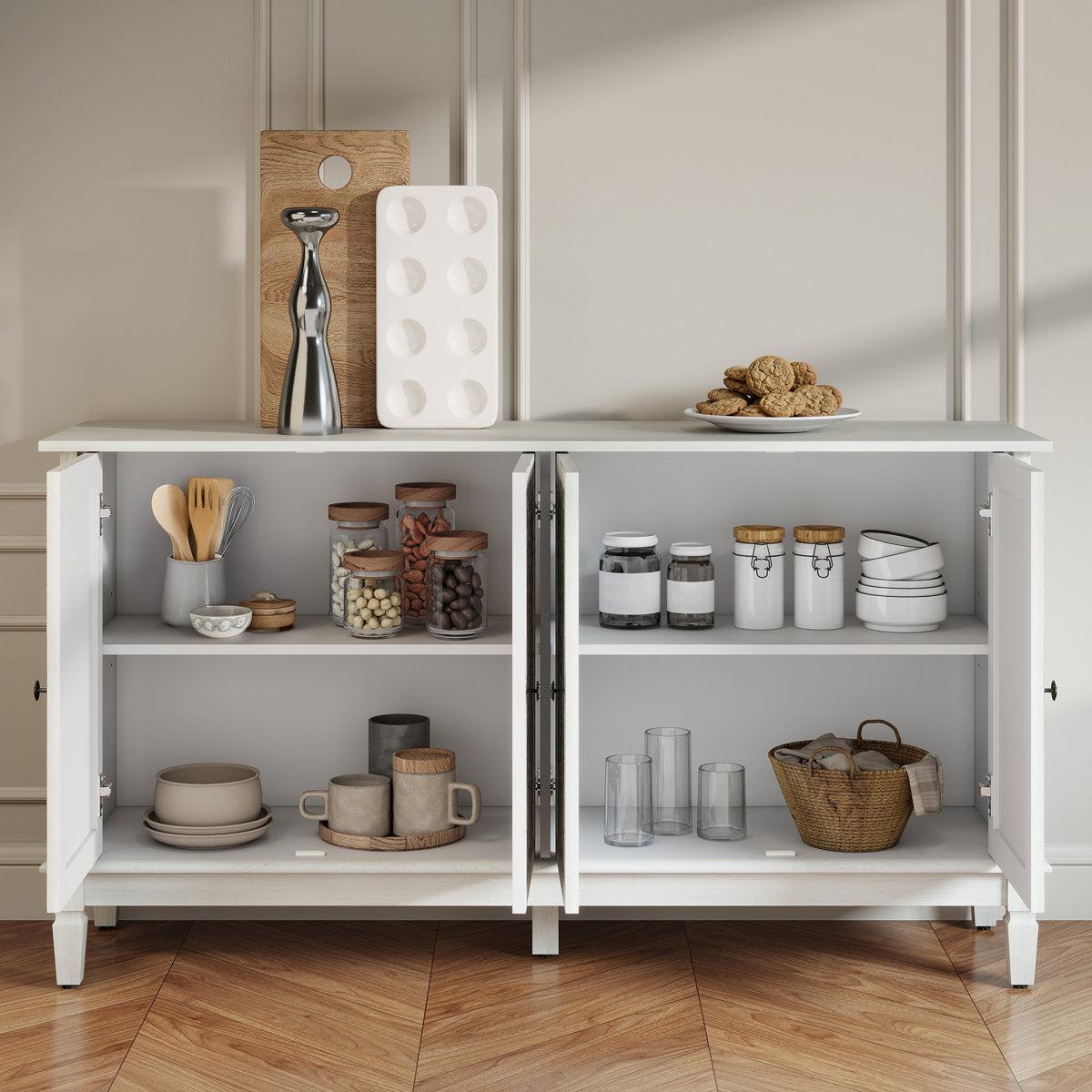 White carved sideboard with all doors open showing storage