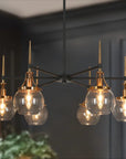 Mercer41 Loram 6-Light Dimmable Drum Chandelier – matte black and gold with glass globe shades