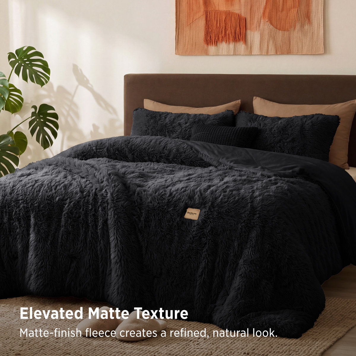 Black faux fur comforter with elevated matte texture