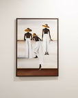 A framed painting on a light beige wall, depicting three stylized figures from behind wearing white garments and straw hats, with a dark brown frame. Caribbean Art