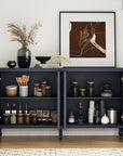 Carved navy blue sideboard with doors open showing shelves