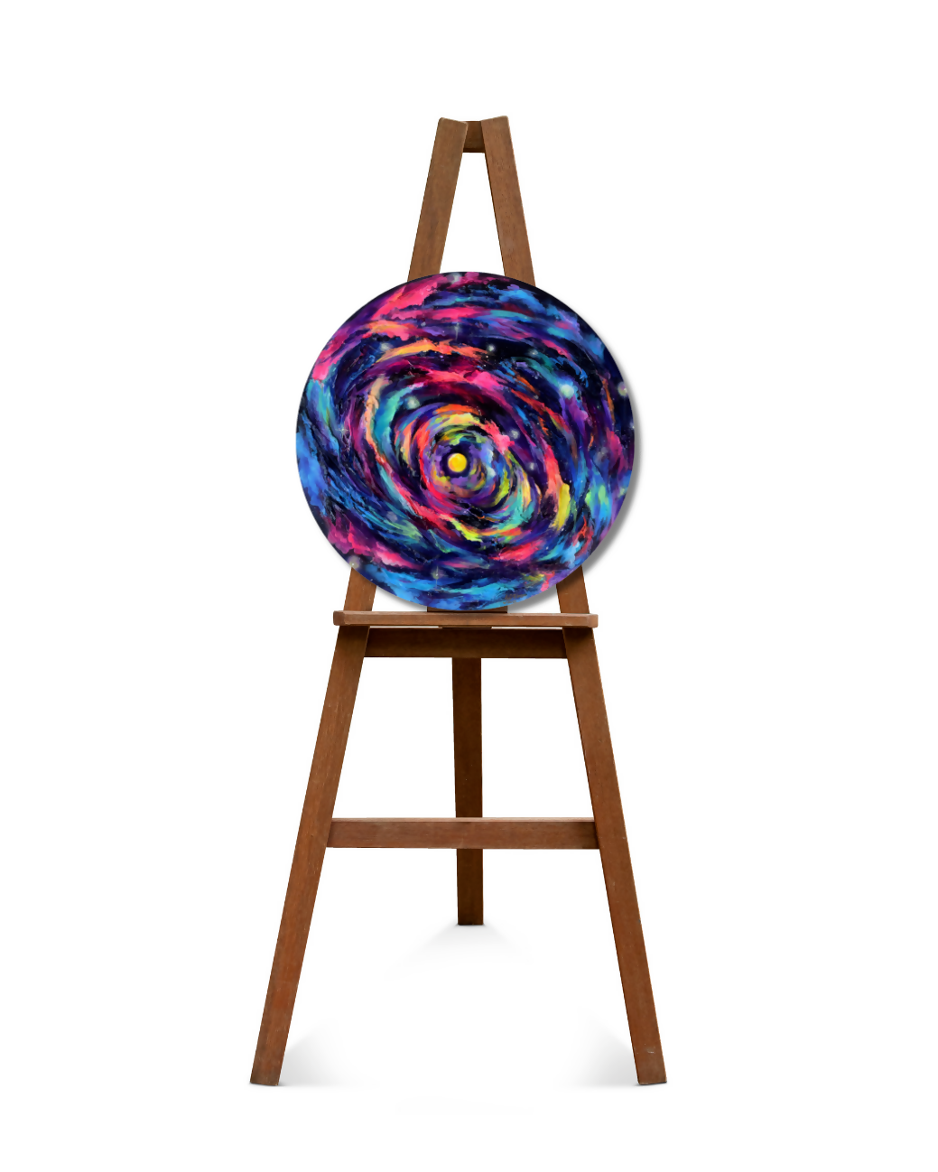 A round canvas print featuring a vibrant, swirling galaxy design in shades of blue, purple, pink, and yellow, displayed on a wooden easel against a solid white background.